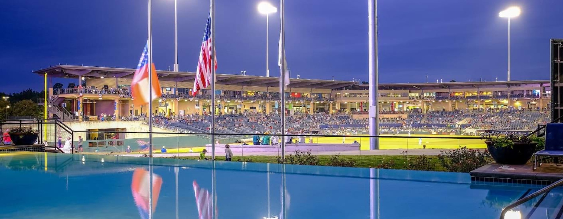a pool with a row of flags