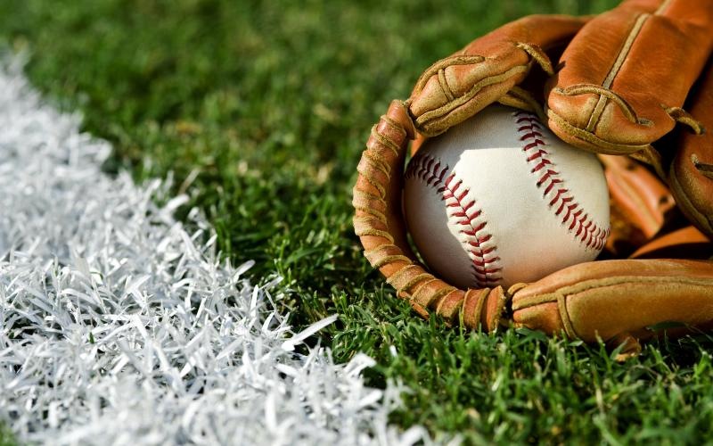 a baseball glove and a baseball