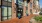 a brick building with a brick walkway