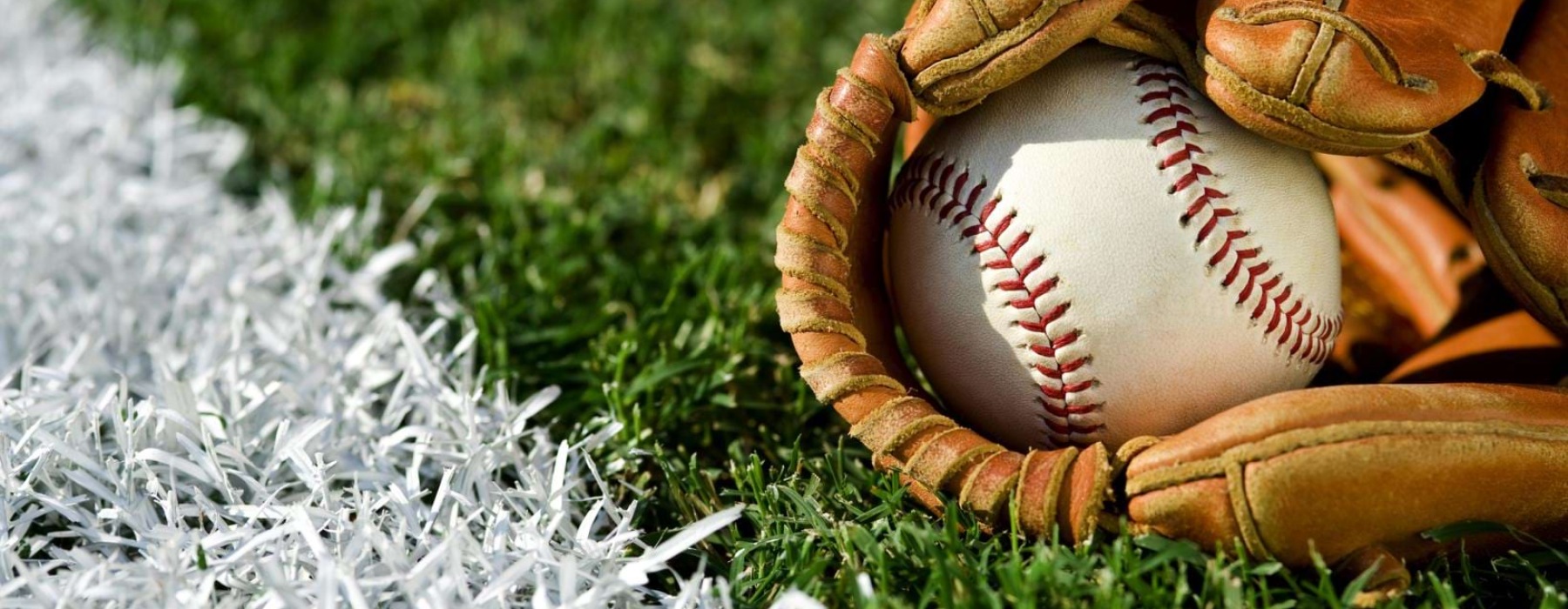 a baseball glove and a baseball