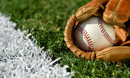 a baseball glove and a baseball