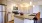 a kitchen with a marble island