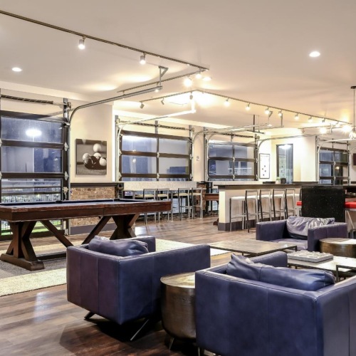 a room with a table and chairs