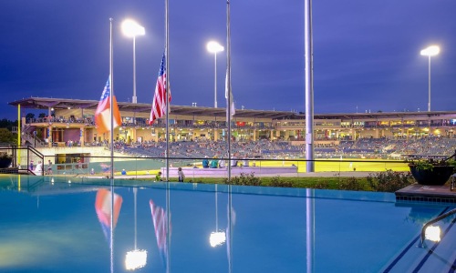 a pool with a row of flags